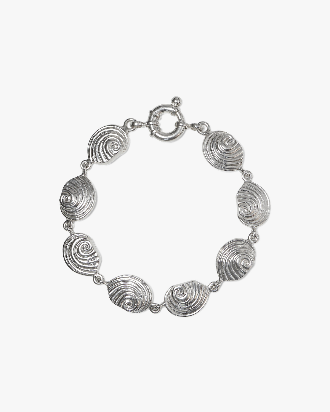 Agalega silver bracelet handmade in Mauritius with spiral seashell charms