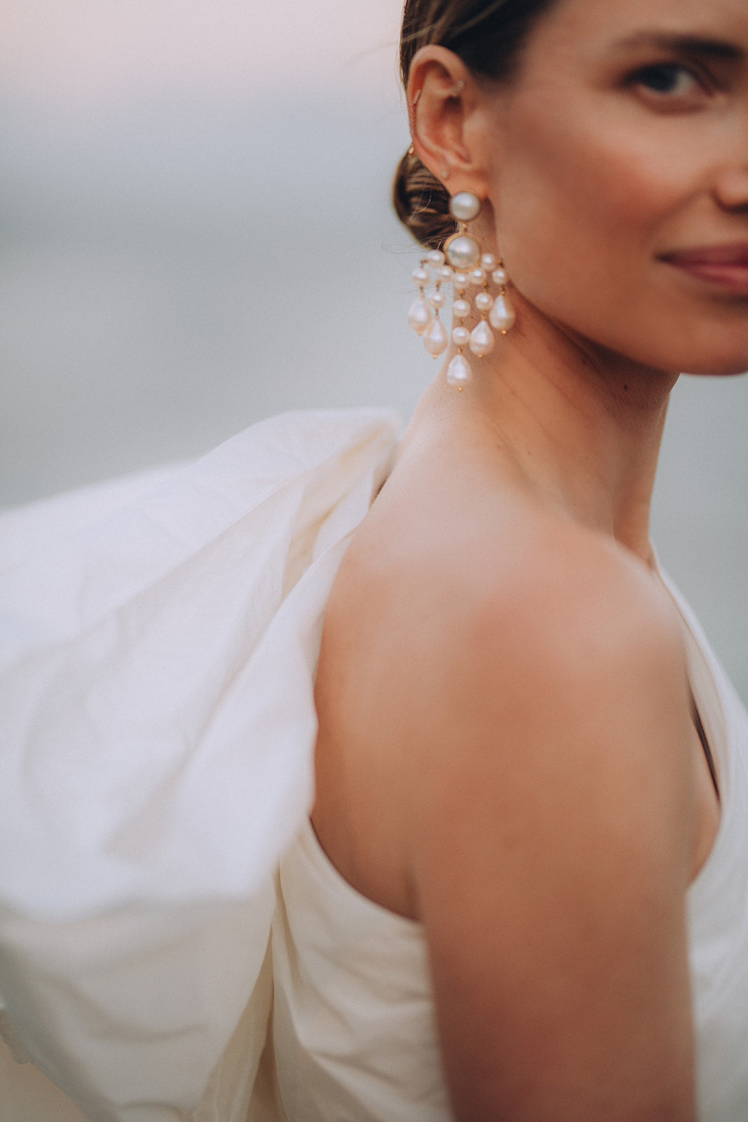 Chandelier Gold cascade pearl necklace featuring 8mm, 10mm and 14mm pearls