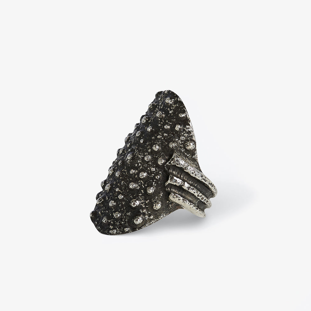 Close-up of Grand Gaube oxidised sterling silver ring with sea urchin-inspired texture