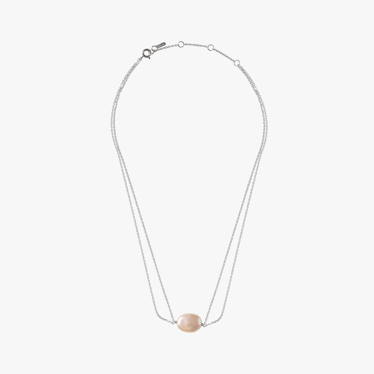 A silver double strand chain necklace with a single pearl centered on the chest area, presented against a white background.