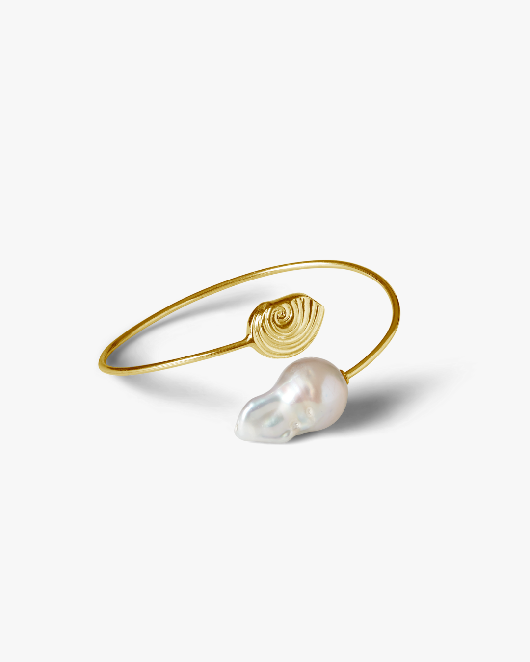 Oceano Trou d'Eau Douce gold spiral bracelet with baroque pearl, handmade in Mauritius