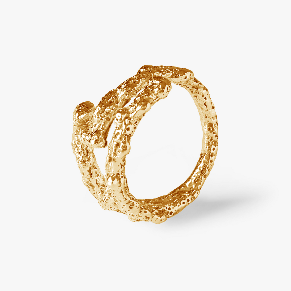 Close-up of the Plaine Corail 18K gold vermeil ring with sculpted coral-inspired texture