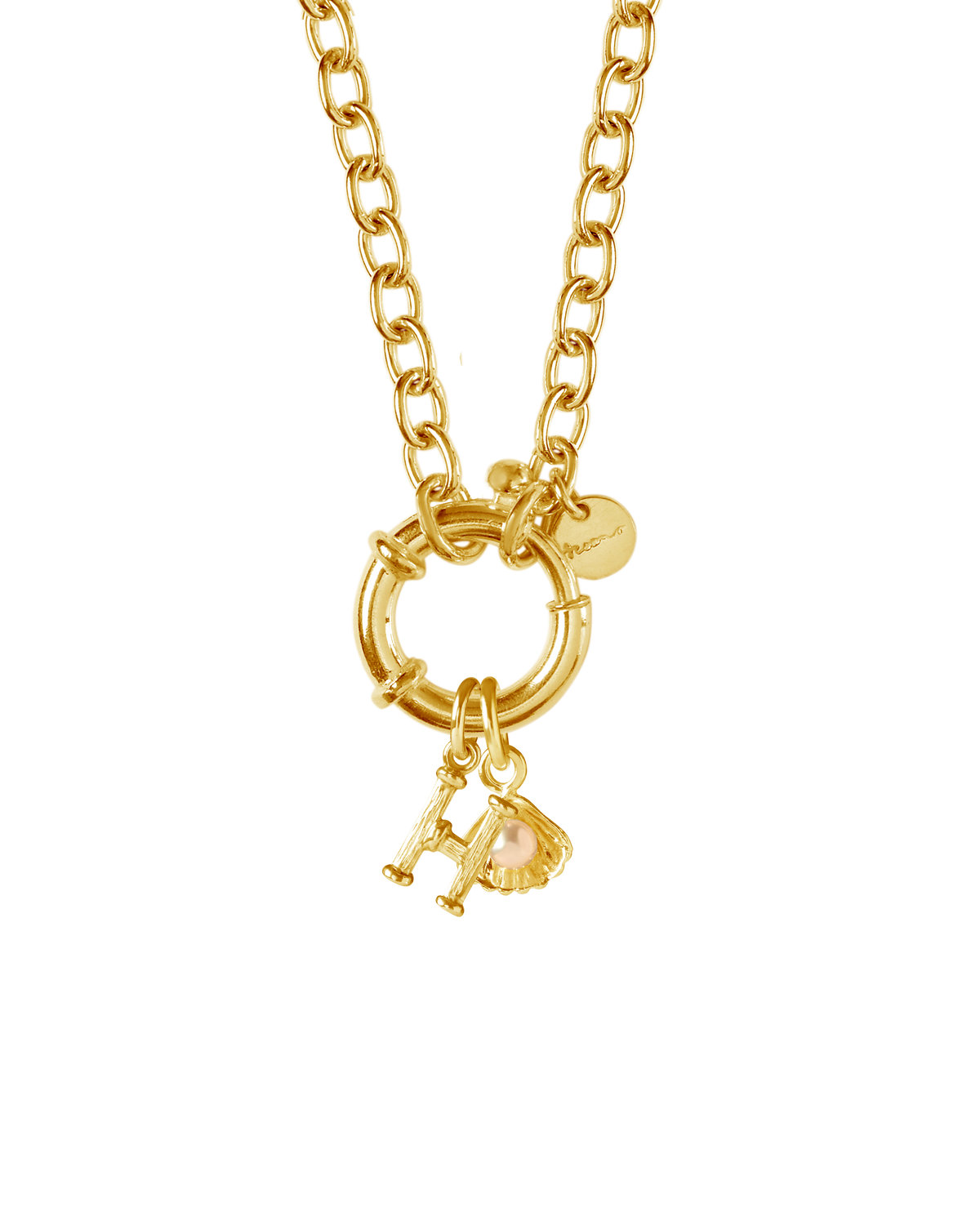 Detail of the handcrafted gold charm necklace from Oceano Jewels