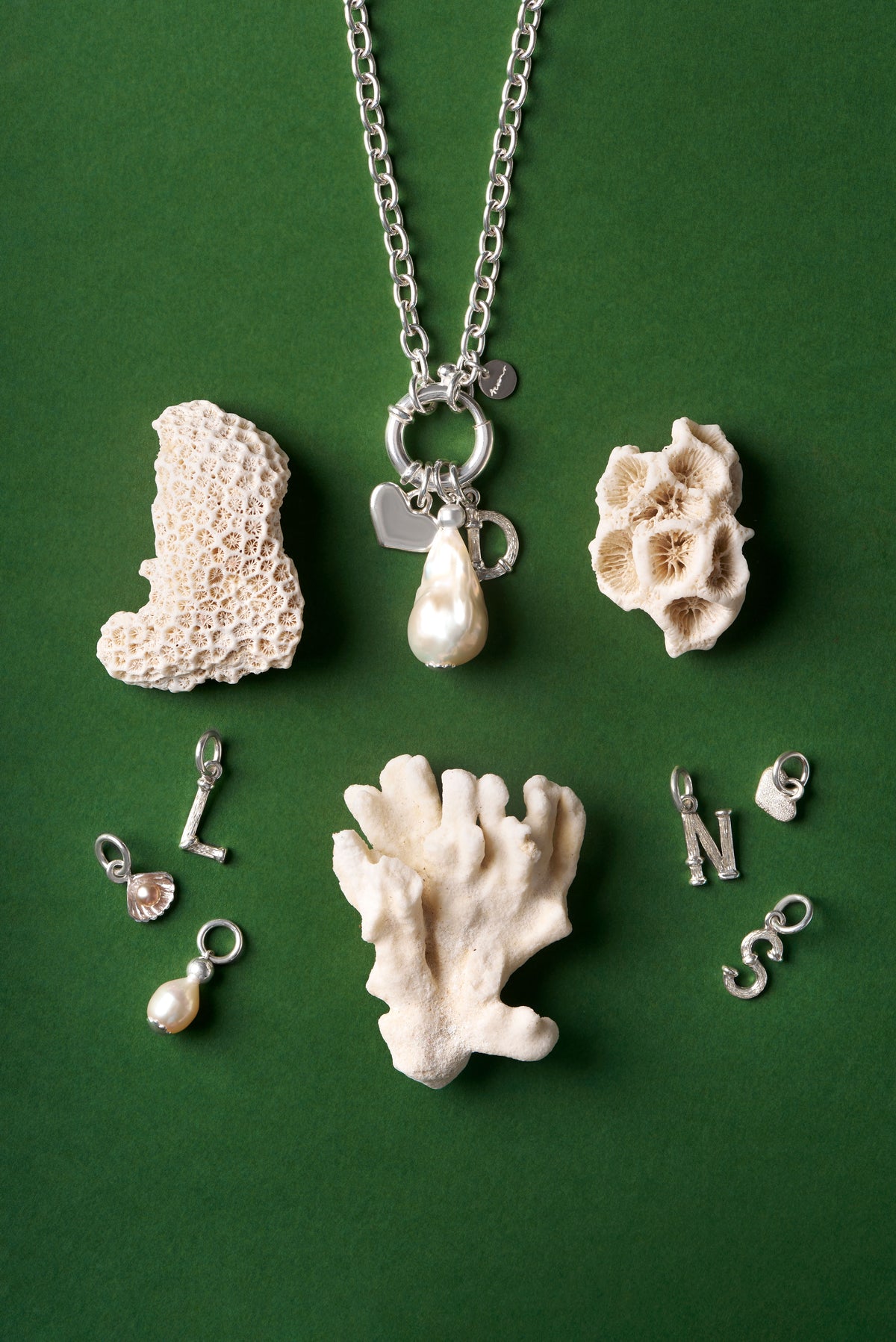 St Geran sterling silver alphabet and charms necklace front view