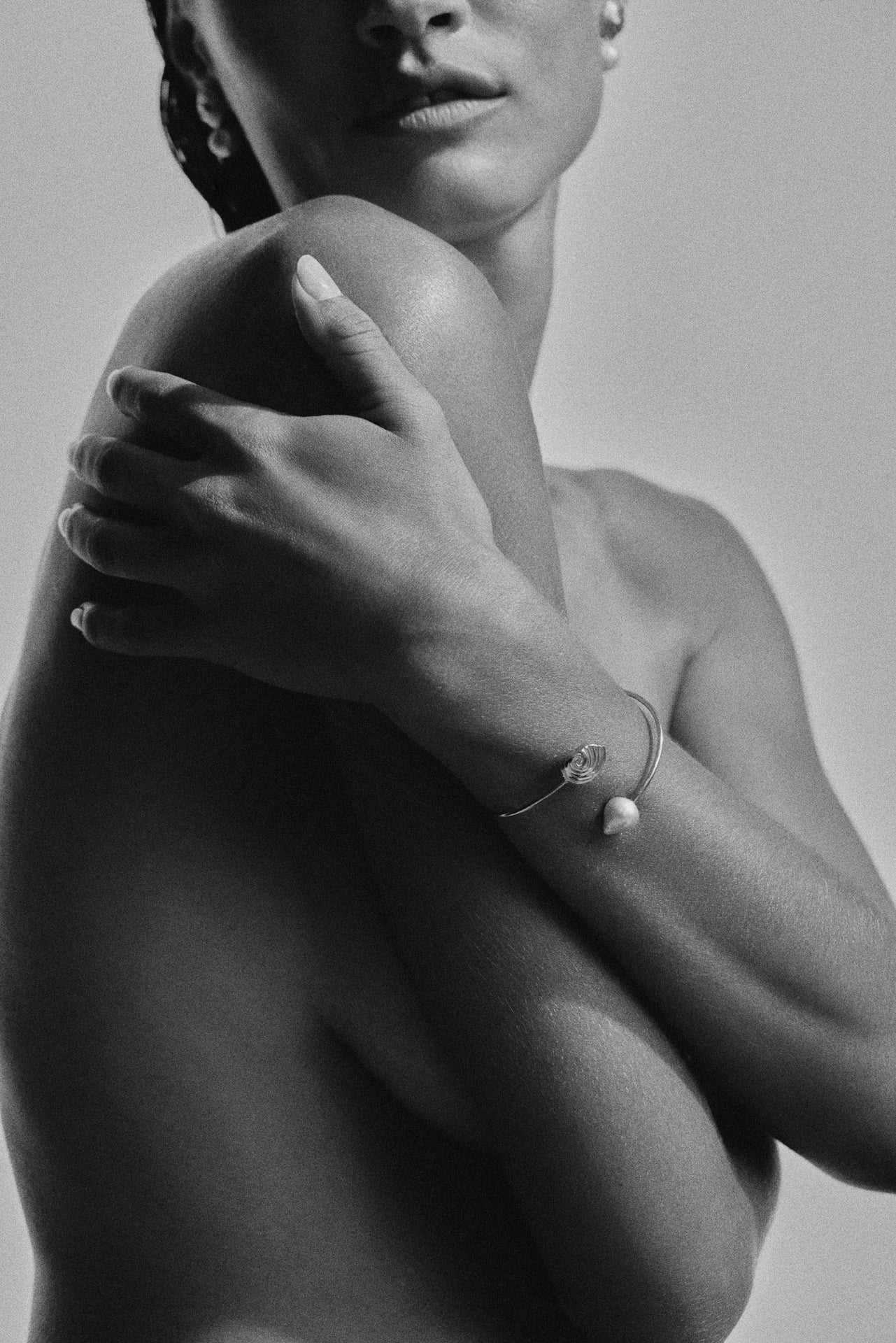 Trou D'eau Douce  solid gold bracelet featuring a natural  baroque pearl