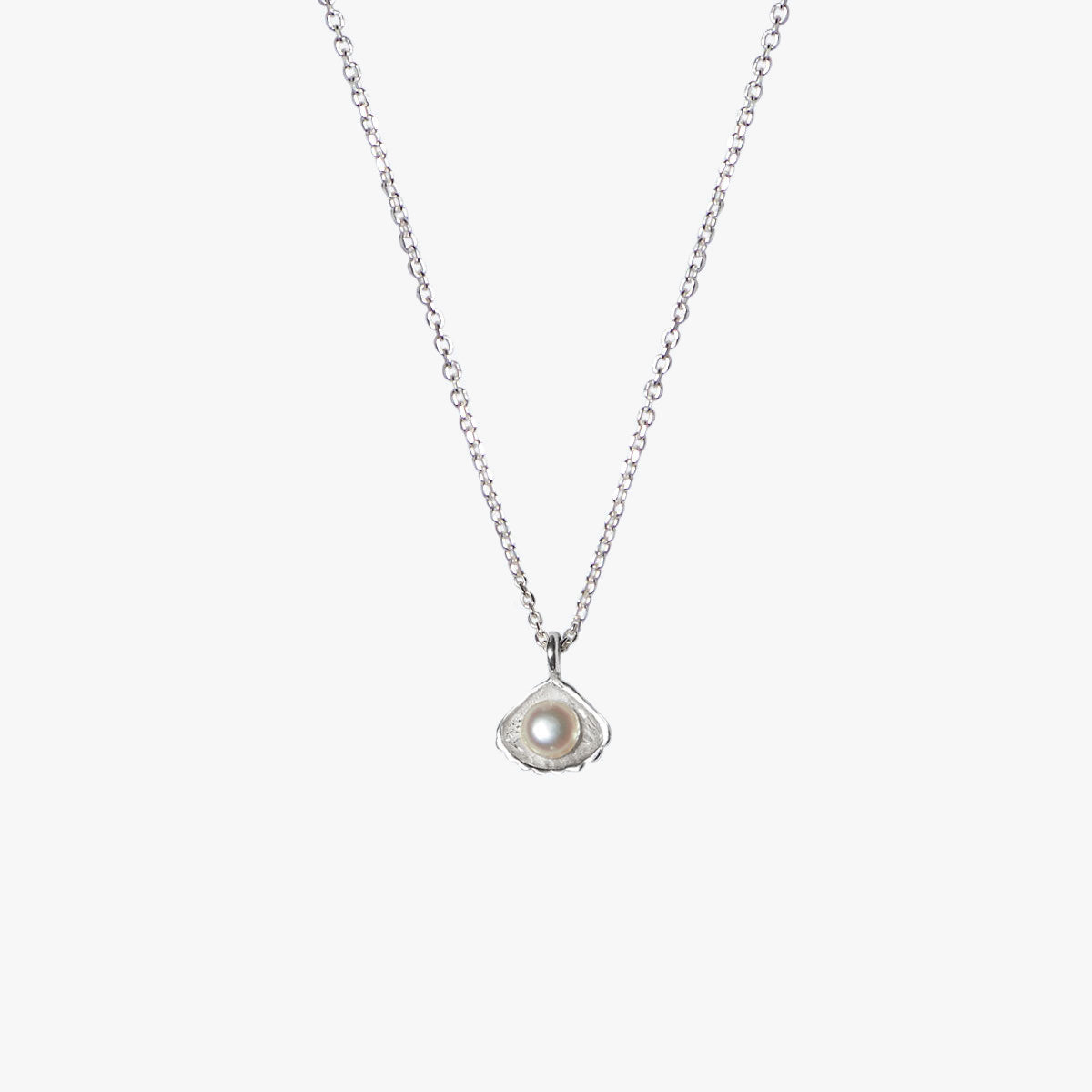 freshwater-pearl-oceano-jewels.jpg
Flacq silver necklace with white freshwater pearl and shell pendant by Oceano Jewels