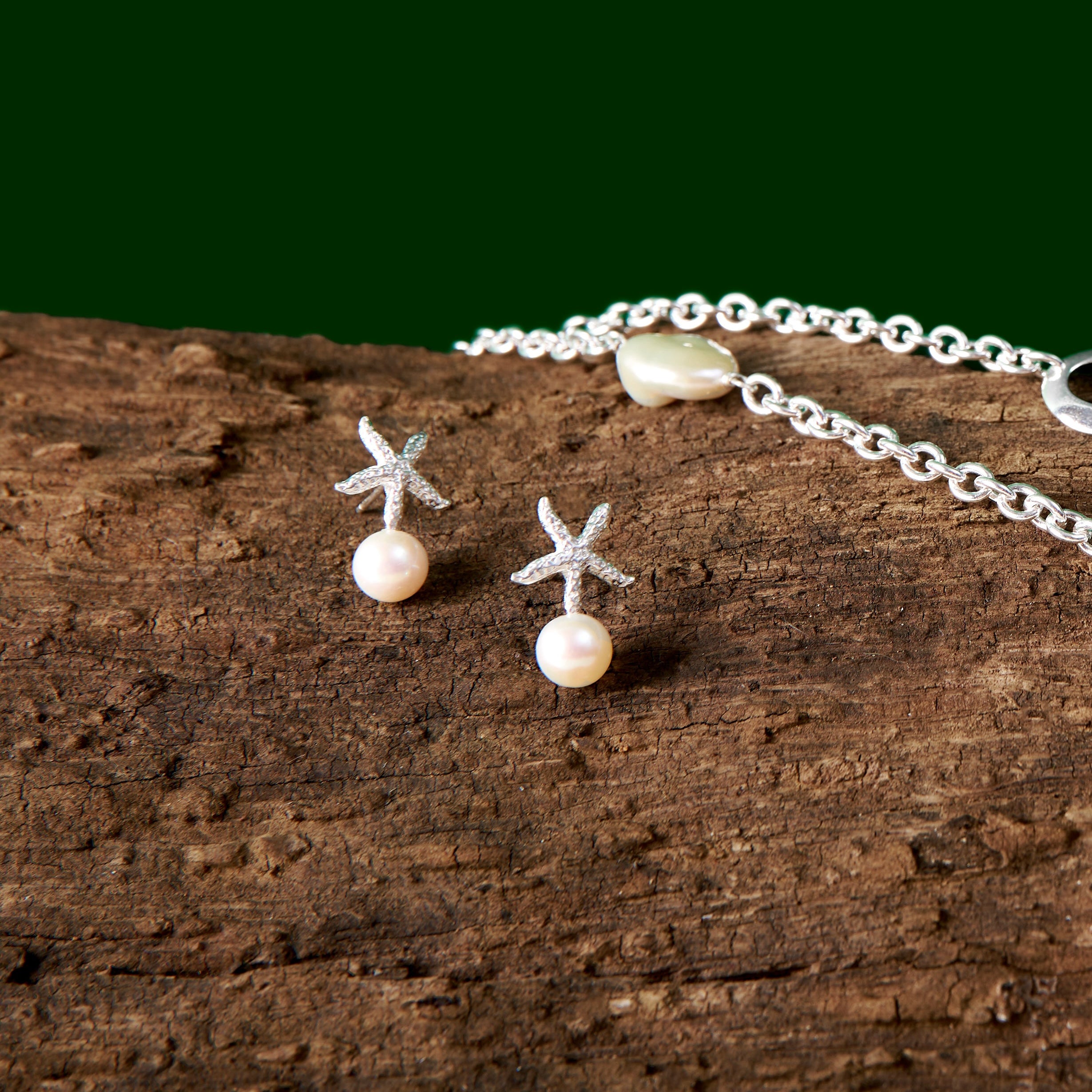 Oceano Jewels Ilot Starfish earrings with luminous white round freshwater pearls and textured starfish