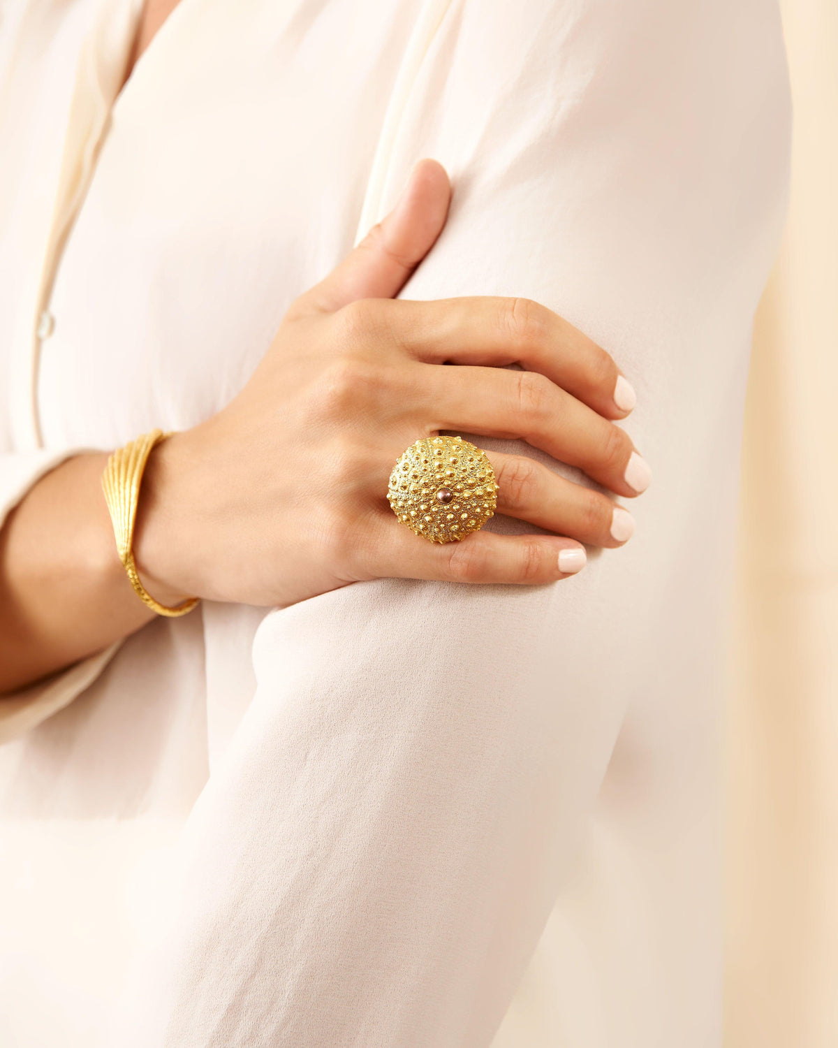 Le Morne Gold 18K gold vermeil bracelet worn on the wrist, handcrafted in Mauritius by Oceano Jewels