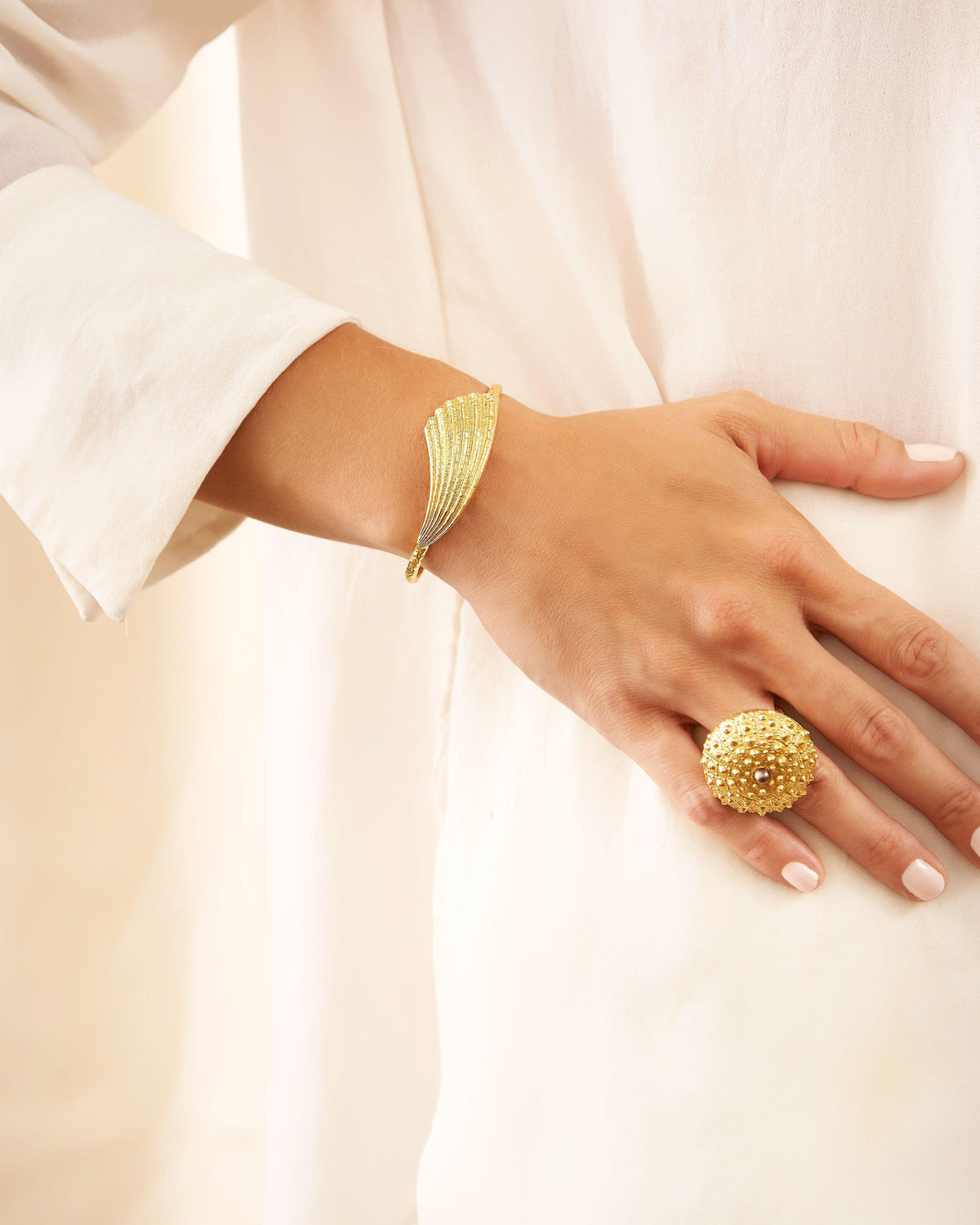 Close-up of the textured Le Morne Gold bracelet crafted from genuine Mauritian shell and gold vermeil