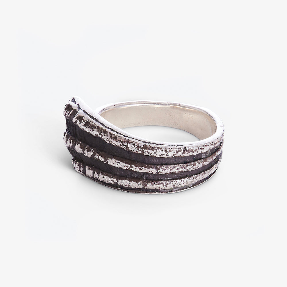 Riambel oxidised sterling silver ring with sculptural wave-inspired design from Mauritius