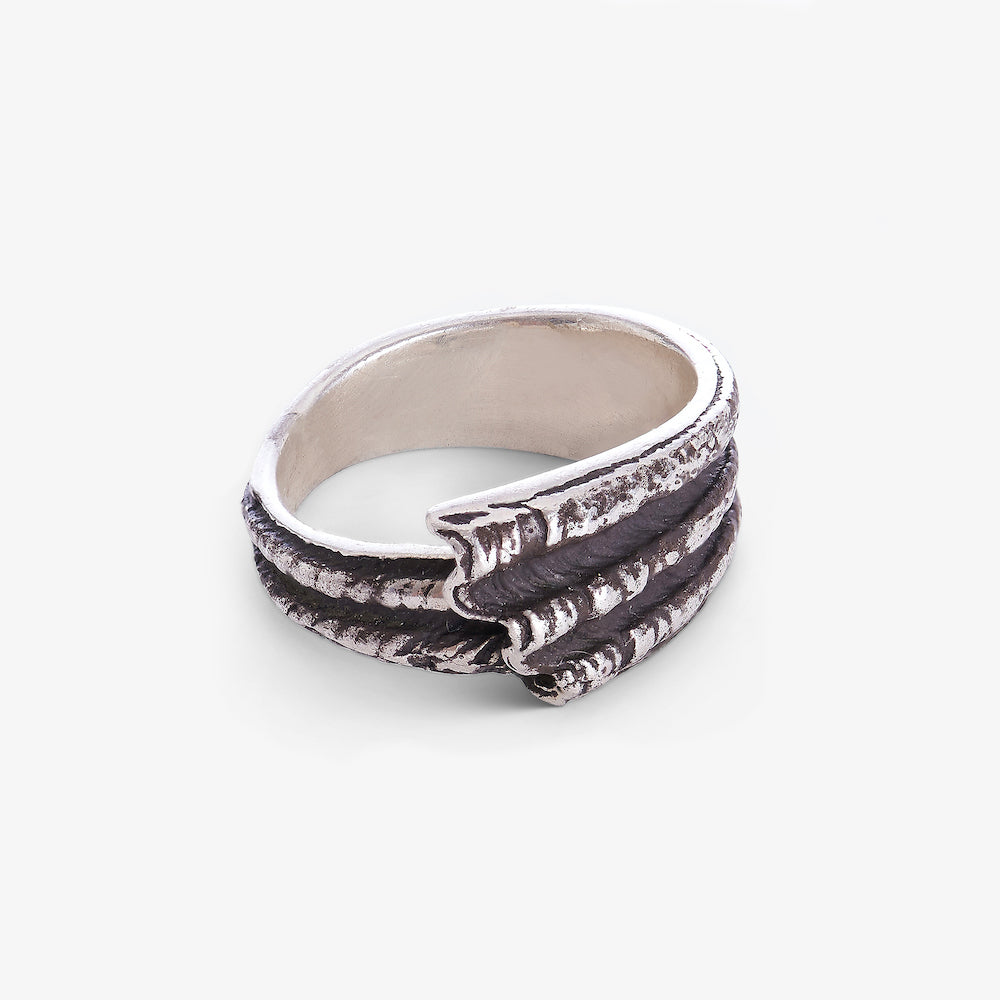 Close-up of Riambel oxidised silver ring showing the textured Mauritian shell design