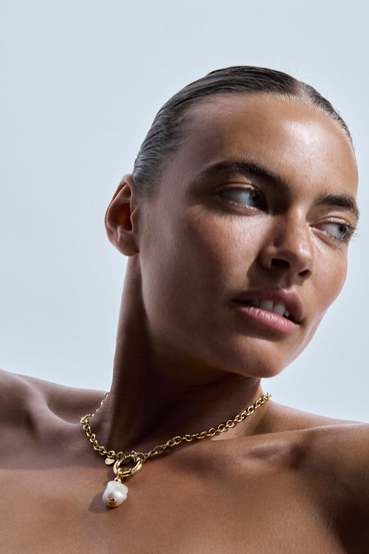 Handcrafted St Géran gold vermeil necklace with luminous freshwater baroque pearl, made by Oceano Jewels in Mauritius