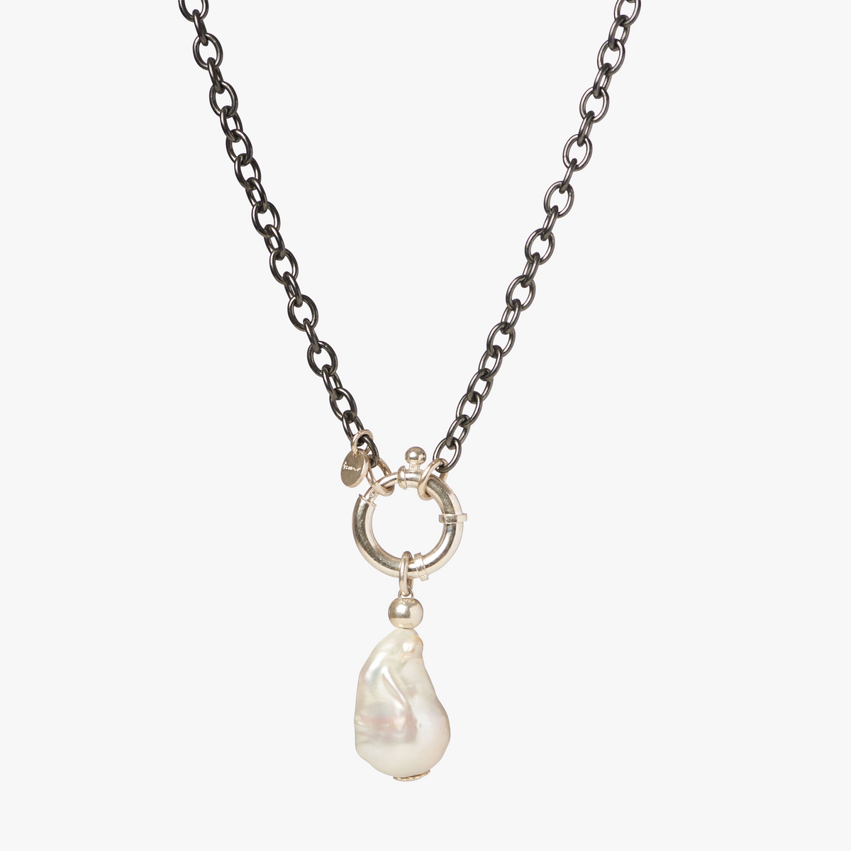 Close-up of the St Géran oxidised sterling silver necklace with a natural 13–14 mm freshwater baroque pearl